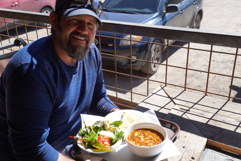 Simon, enjoying a meal on the patio outside Clean Kitchen